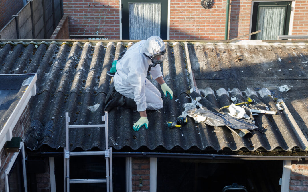 Man on a roof disposing of asbestos
