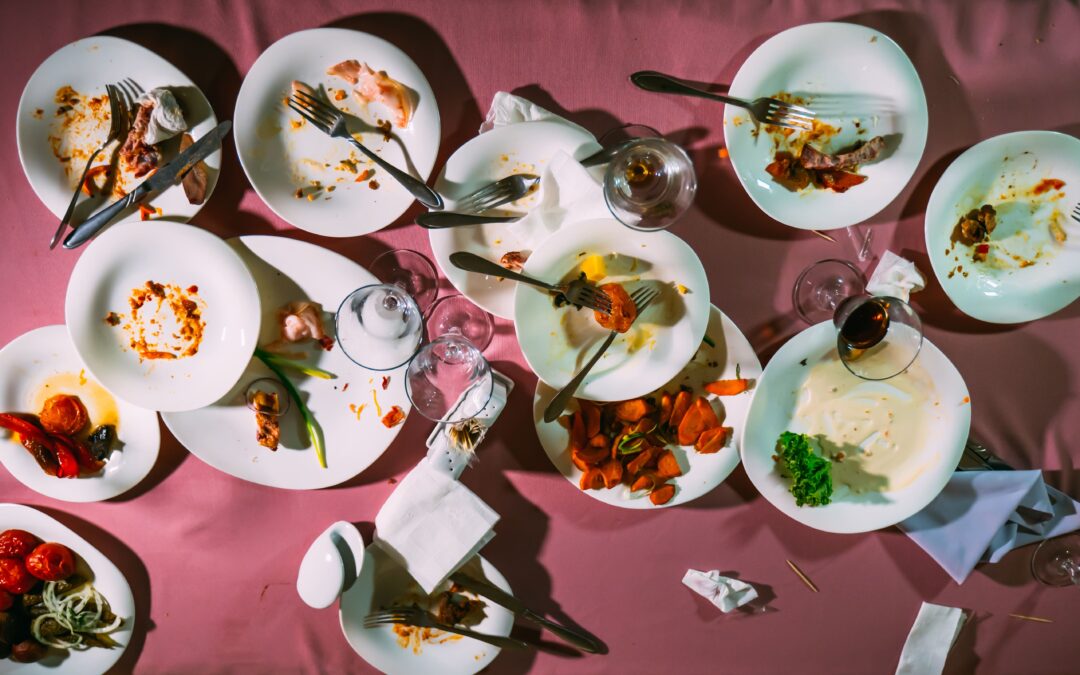 Restaurant food waste on table with burgundy table cloth
